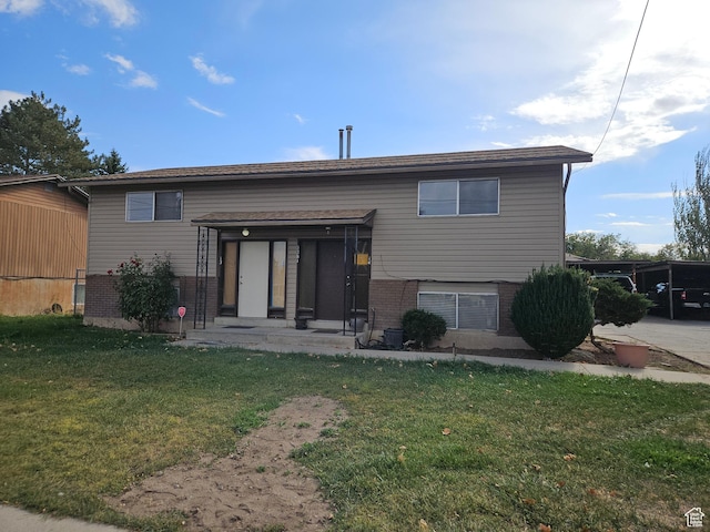 3381 W 4100 S, West Valley City, UT 84119 - back of house with a lawn
