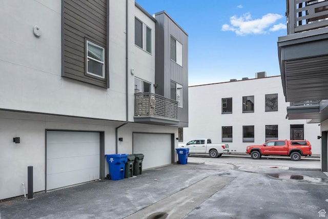 1570 S Main St Unit 102, Salt Lake City, UT 84115 - exterior space with a garage