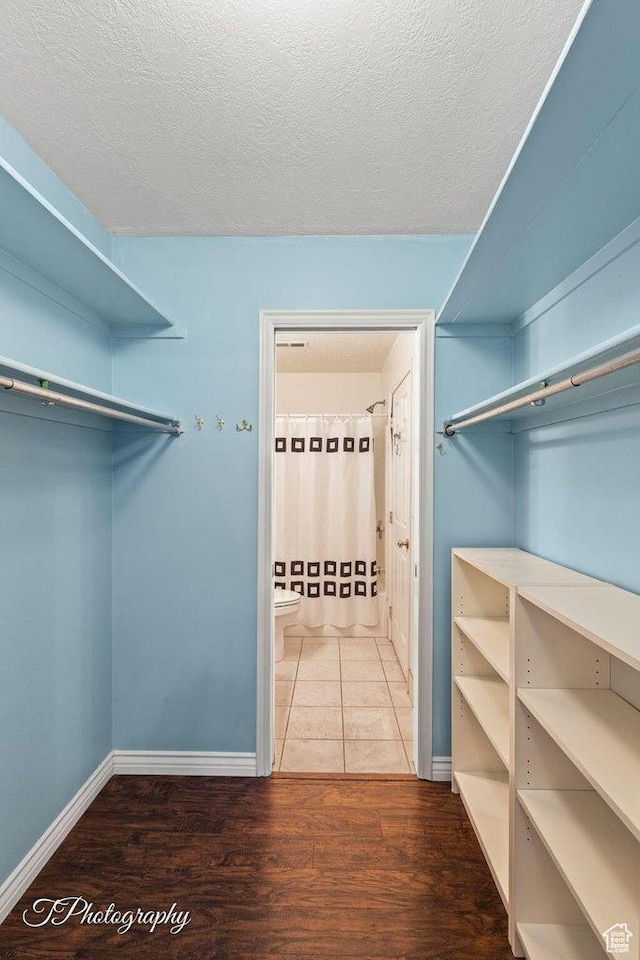 1050 W Red Hills Pkwy Unit 2, Washington, UT 84780 - walk in closet with hardwood / wood-style flooring
