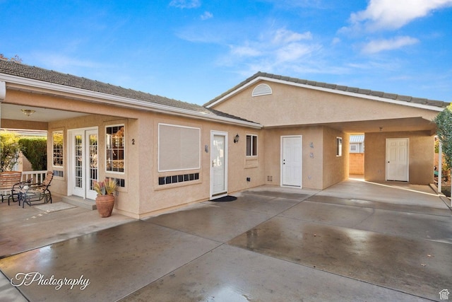 1050 W Red Hills Pkwy Unit 2, Washington, UT 84780 - view of front of home with a patio area
