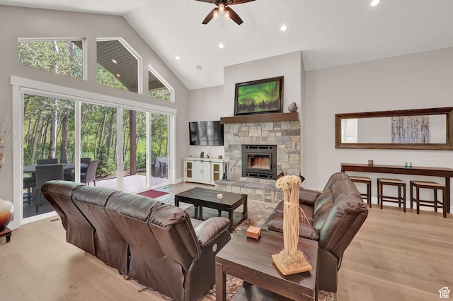 10694 E Cottonwood Ln Unit 539, Heber City, UT 84032 - living area with ceiling fan, a stone fireplace, recessed lighting, light wood-style flooring, and high vaulted ceiling