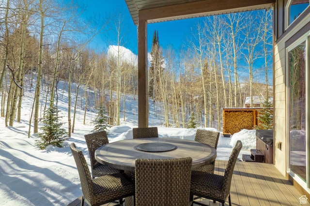 10694 E Cottonwood Ln Unit 539, Heber City, UT 84032 - snow covered patio featuring a wooden deck and outdoor dining area