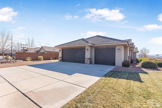 1987 S 2940 E, St George, UT 84790 - view of front of home featuring a front yard and a garage