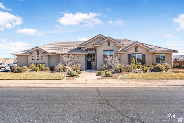 view of front of home with a front yard