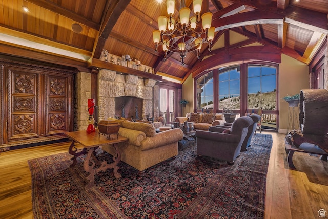 17 White Pine Canyon Rd, Park City, UT 84060 - living area featuring vaulted ceiling with beams, a chandelier, wood ceiling, a fireplace, and wood-type flooring