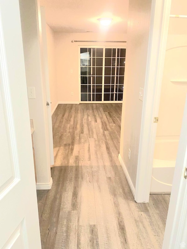 1617 W Treille Ct Unit I12, West Valley City, UT 84119 - corridor with wood-type flooring