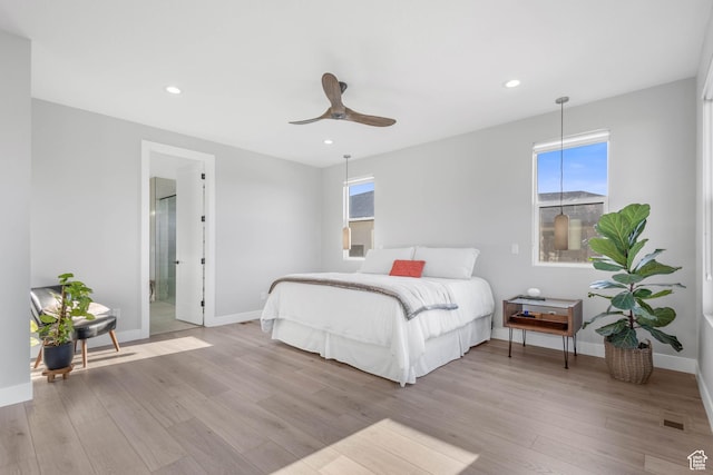 51 N Gray Fox Cir, Kaysville, UT 84037 - bedroom featuring ceiling fan, ensuite bath, light wood-type flooring, and multiple windows
