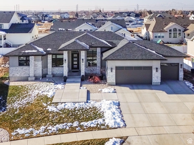 view of front of property with a garage