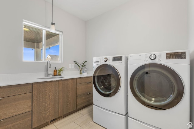 51 N Gray Fox Cir, Kaysville, UT 84037 - laundry area with sink, cabinets, and independent washer and dryer