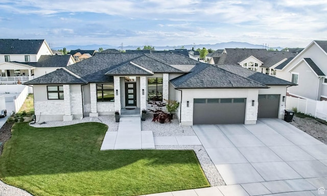 51 N Gray Fox Cir, Kaysville, UT 84037 - view of front of property featuring a garage, driveway, a residential view, and a shingled roof