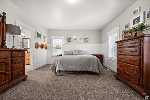 277 W Canyon Crest Rd, Alpine, UT 84004 - carpeted bedroom featuring a decorative wall and wainscoting
