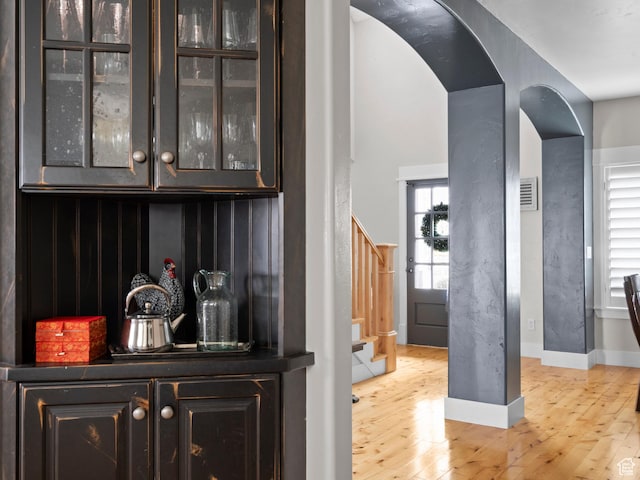 277 W Canyon Crest Rd, Alpine, UT 84004 - bar with plenty of natural light, stairway, visible vents, and light wood-type flooring