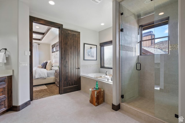 bathroom with vanity, tile patterned flooring, and independent shower and bath