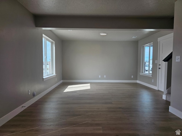 1447 W 500 N Lot 17, Springville, UT 84663 - empty room with dark wood-style floors, stairway, a textured ceiling, and baseboards