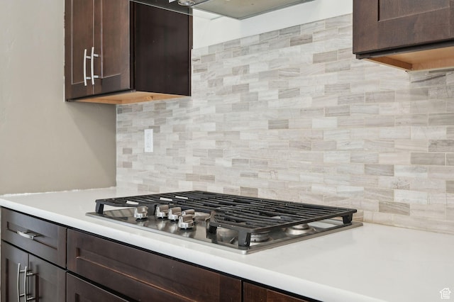 6343 W 7900 S, West Jordan, UT 84081 - kitchen featuring decorative backsplash, stainless steel gas stovetop, and dark brown cabinets