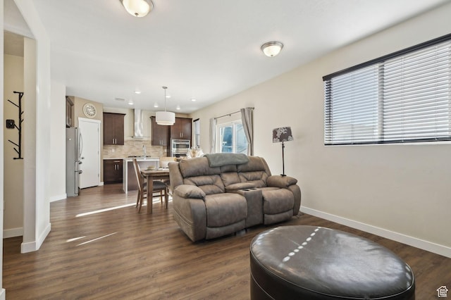 6343 W 7900 S, West Jordan, UT 84081 - living room featuring dark wood-type flooring and sink