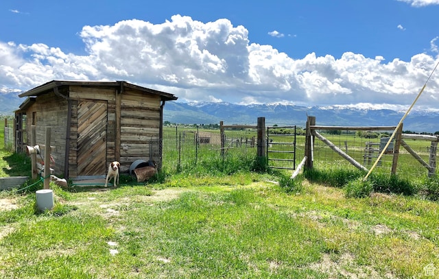 19600 N 8250 E, Mount Pleasant, UT 84647 - view of outbuilding featuring a rural view, an outbuilding, fence, and a mountain view