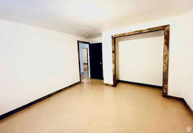 19600 N 8250 E, Mount Pleasant, UT 84647 - spare room featuring concrete floors and baseboards