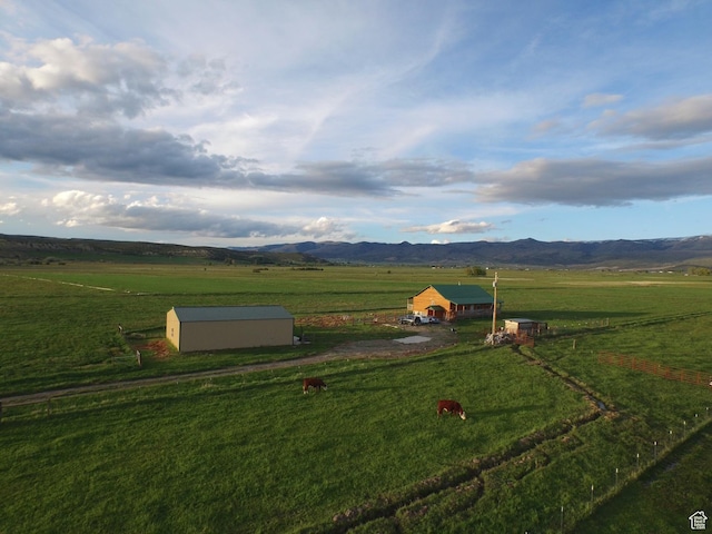 19600 N 8250 E, Mount Pleasant, UT 84647 - view of yard featuring a storage unit, an outbuilding, a rural view, and a mountain view