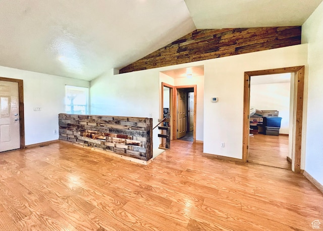19600 N 8250 E, Mount Pleasant, UT 84647 - living room with baseboards, lofted ceiling, wood finished floors, and stairs