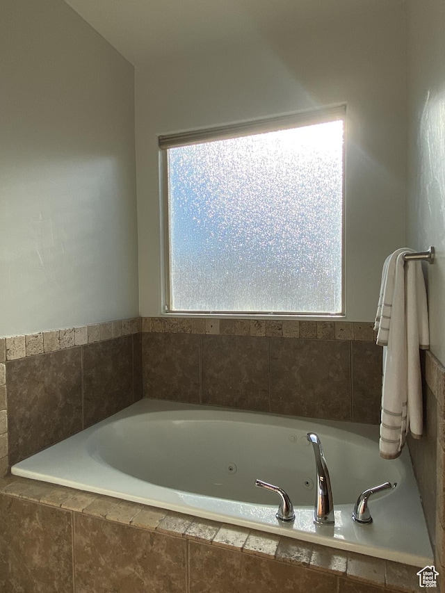 1918 S Mojave Dr, Washington, UT 84780 - bathroom featuring a relaxing tiled tub