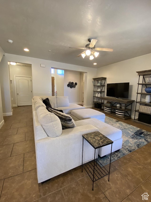 1918 S Mojave Dr, Washington, UT 84780 - tiled living room featuring ceiling fan