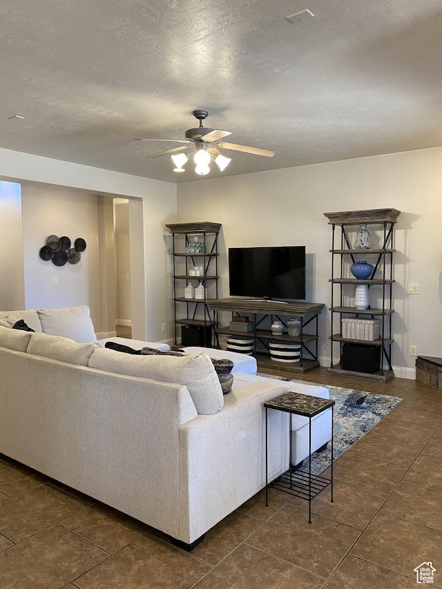 1918 S Mojave Dr, Washington, UT 84780 - living room with ceiling fan and a textured ceiling