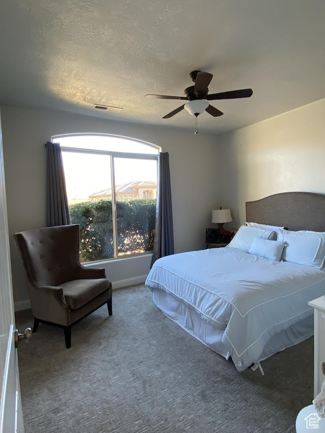 1918 S Mojave Dr, Washington, UT 84780 - carpeted bedroom featuring ceiling fan