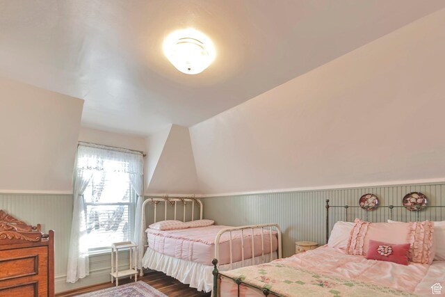 320 S 800 W, Lewiston, UT 84320 - bedroom featuring lofted ceiling, a wainscoted wall, and dark wood-style flooring