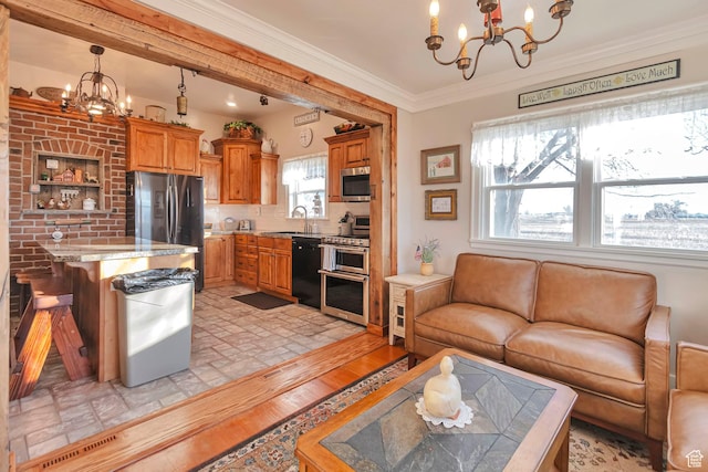 320 S 800 W, Lewiston, UT 84320 - living area with a notable chandelier and crown molding