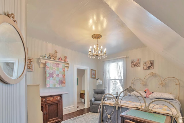 320 S 800 W, Lewiston, UT 84320 - bedroom with baseboards, wood finished floors, and a notable chandelier