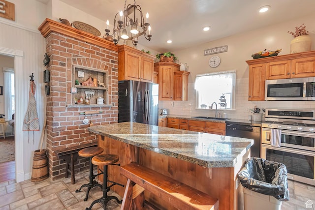 320 S 800 W, Lewiston, UT 84320 - kitchen with a sink, light stone countertops, stone finish flooring, tasteful backsplash, and appliances with stainless steel finishes