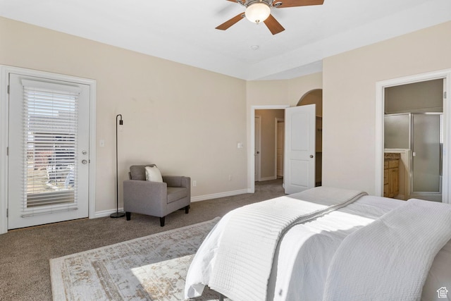 carpeted bedroom featuring ceiling fan and ensuite bathroom