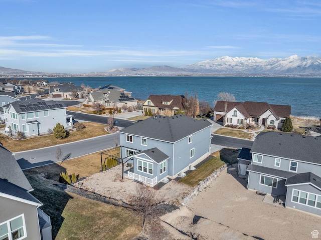 bird's eye view featuring a water and mountain view