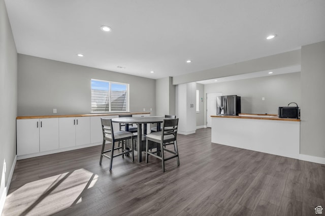 dining area featuring hardwood / wood-style flooring
