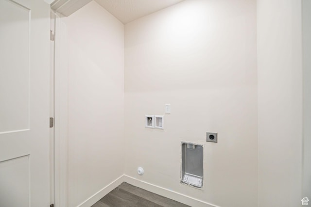 clothes washing area with hookup for a washing machine, wood-type flooring, and electric dryer hookup