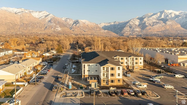 birds eye view of property with a mountain view