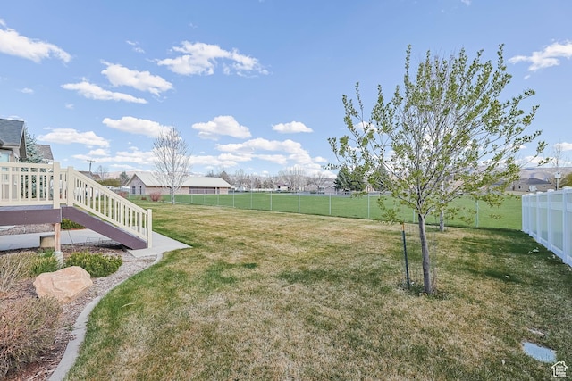 view of yard with a fenced backyard