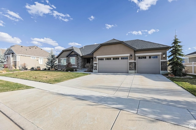 view of front of property with a front lawn, driveway, stone siding, a garage, and stucco siding