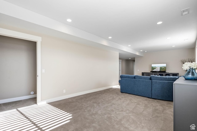 living room featuring light colored carpet, baseboards, visible vents, and recessed lighting