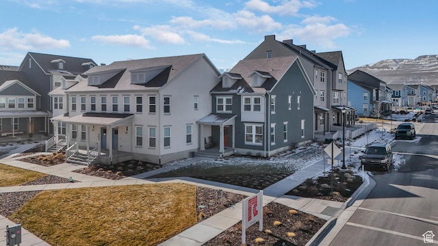 view of front of house featuring a mountain view