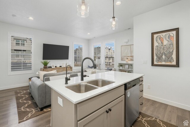6671 W Skip Rock Rd, South Jordan, UT 84009 - kitchen featuring dark hardwood / wood-style floors, dishwasher, pendant lighting, sink, and a kitchen island with sink