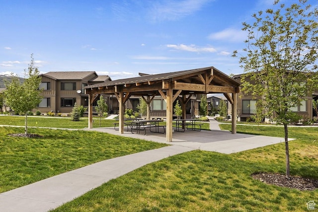 view of community with a yard and a gazebo