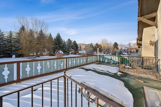 view of snow covered deck