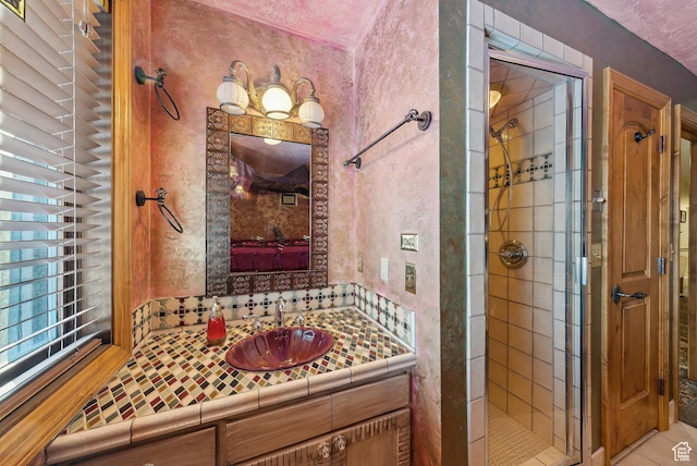 bathroom featuring vanity and walk in shower