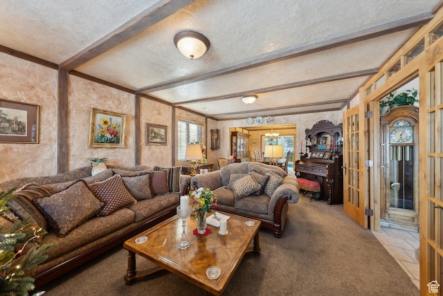 living room with an inviting chandelier, beam ceiling, french doors, and a textured ceiling