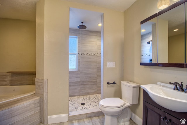 full bathroom featuring toilet, vanity, independent shower and bath, and hardwood / wood-style floors
