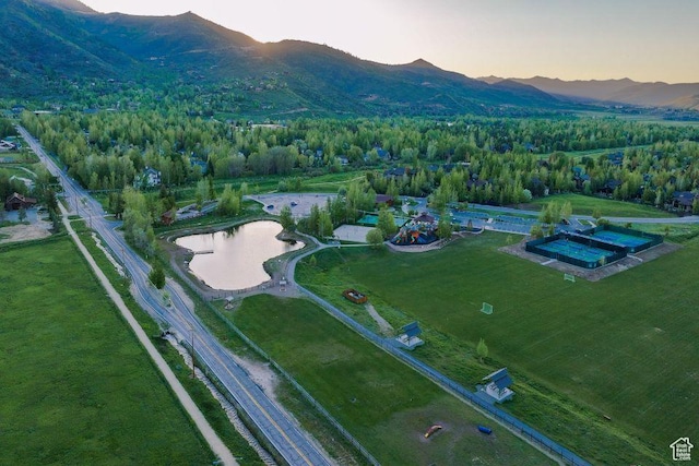 5220 N Old Ranch Rd, Park City, UT 84098 - aerial view of property and surrounding area with a mountain backdrop and a heavily wooded area