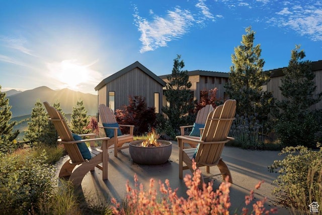 5220 N Old Ranch Rd, Park City, UT 84098 - view of patio / terrace with a fire pit and a mountain view