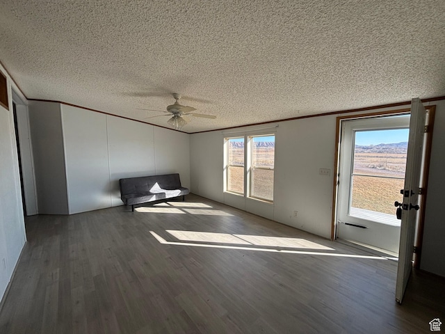 interior space featuring ceiling fan